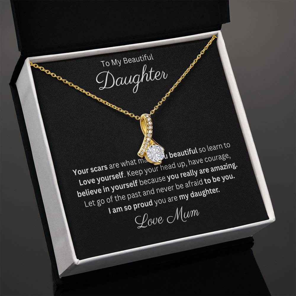 Petite Ribbon Pendant Necklace 14k white gold finish or 18k yellow gold finish over stainless steel with 7mm cubic zirconia 