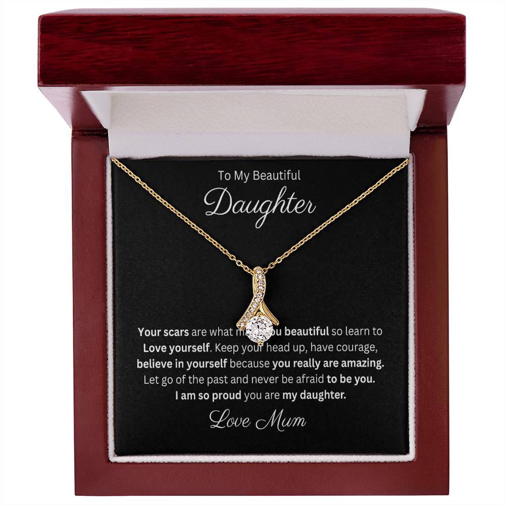 Petite Ribbon Pendant Necklace 14k white gold finish or 18k yellow gold finish over stainless steel with 7mm cubic zirconia 