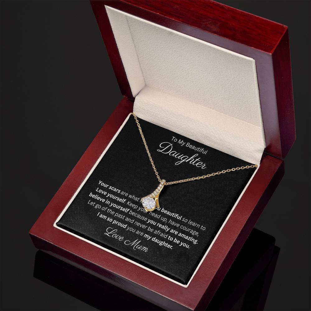 Petite Ribbon Pendant Necklace 14k white gold finish or 18k yellow gold finish over stainless steel with 7mm cubic zirconia 