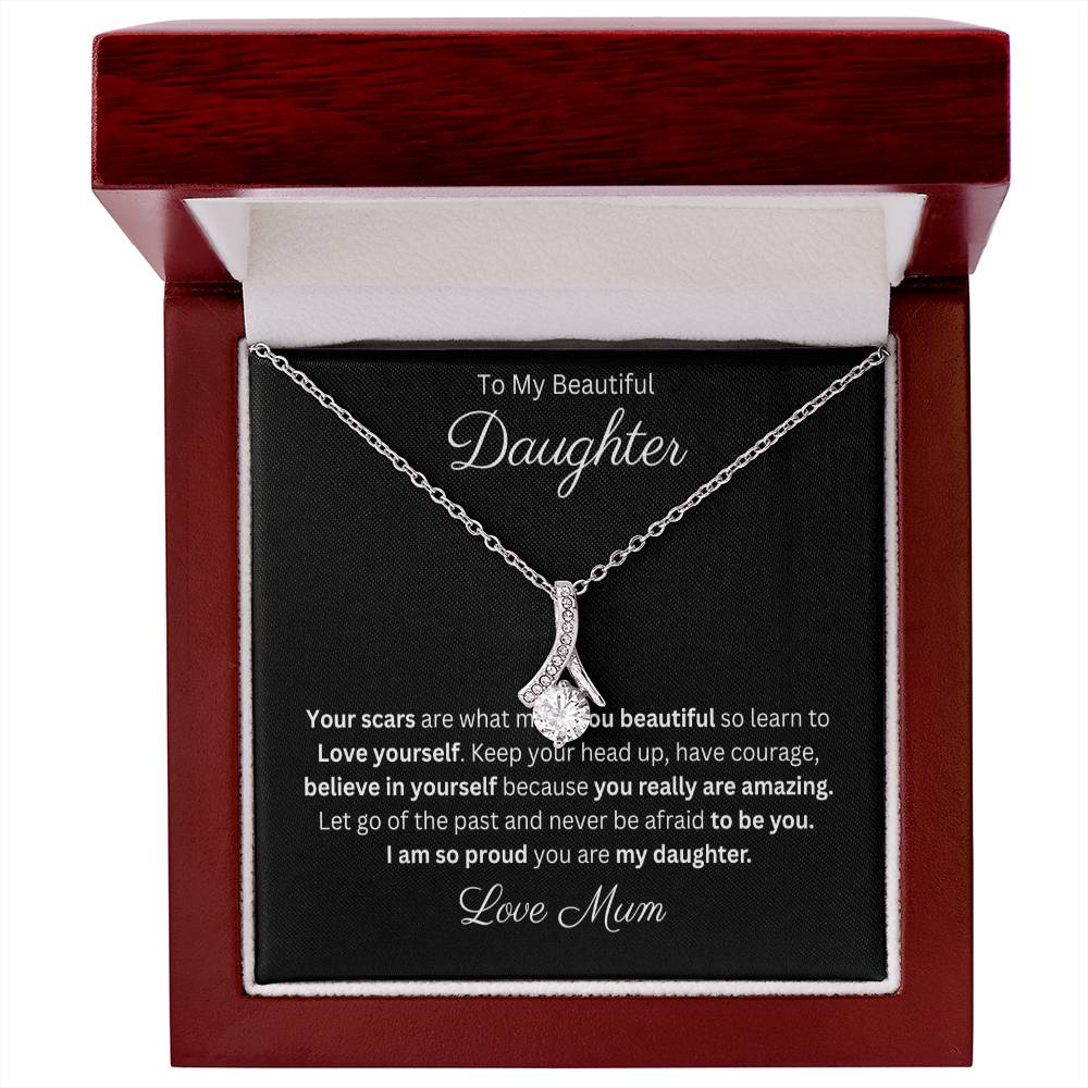 Petite Ribbon Pendant Necklace 14k white gold finish or 18k yellow gold finish over stainless steel with 7mm cubic zirconia 