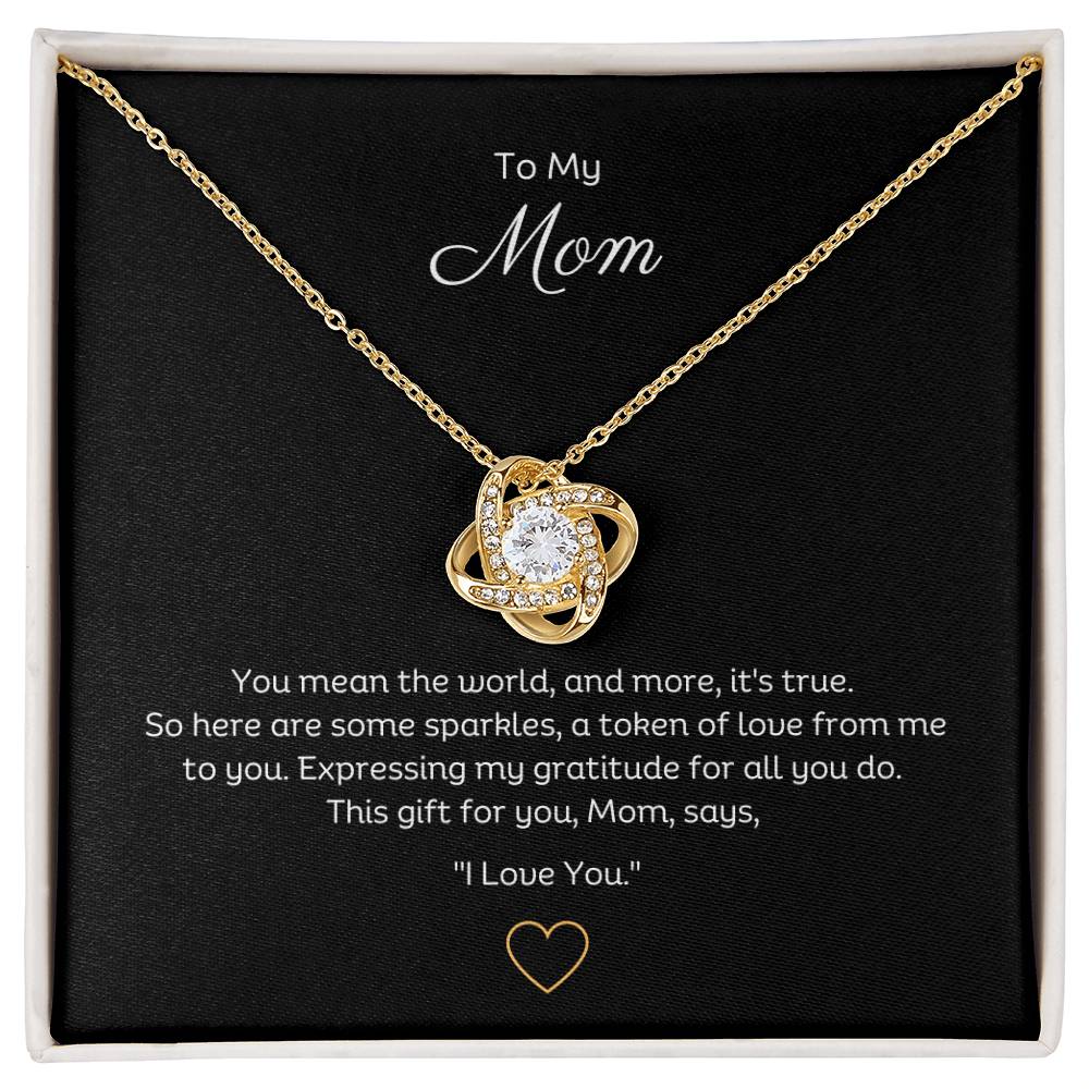 To My Mom, Beautiful Love Knot 14k or 18k finish Necklace. Features a beautiful pendant embellished with premium cubic zirconia crystals.