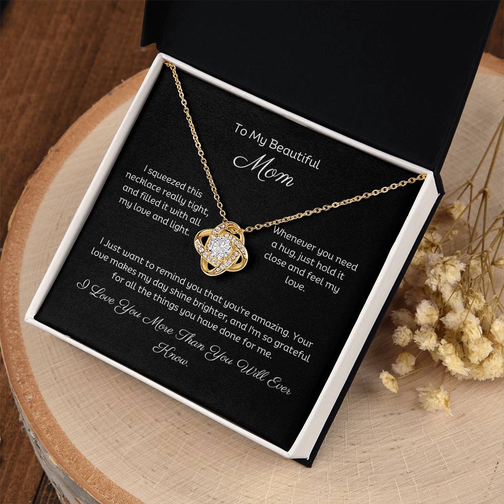 To My Mom, Beautiful Love Knot 14k or 18k finish Necklace. Features a beautiful pendant embellished with premium cubic zirconia crystals and heartfelt message card.