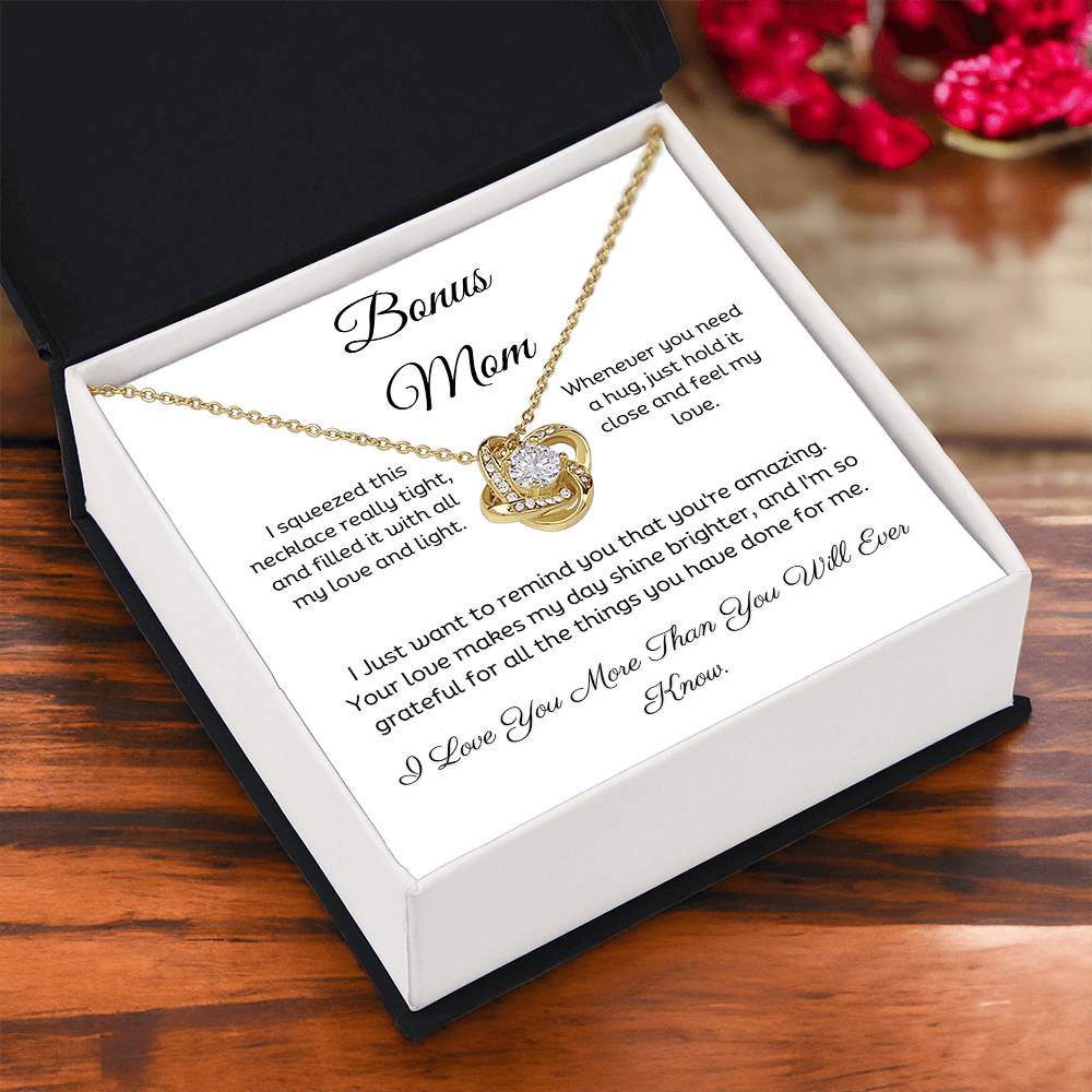 Bonus Mom, Beautiful Love Knot 14k or 18k finish Necklace. Features a beautiful pendant embellished with premium cubic zirconia crystals and heartfelt message card.