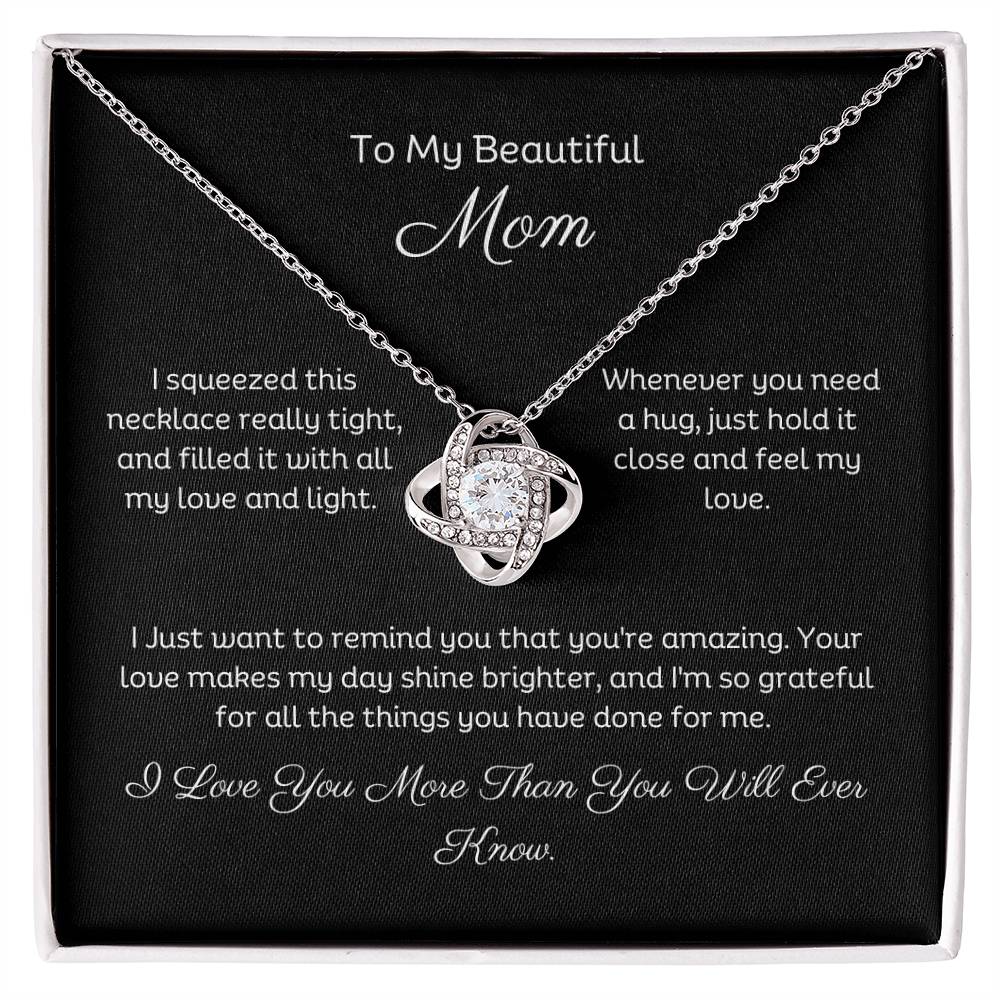 To My Mom, Beautiful Love Knot 14k or 18k finish Necklace. Features a beautiful pendant embellished with premium cubic zirconia crystals and heartfelt message card.