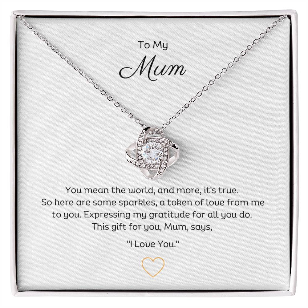 To My Mum, Beautiful Love Knot 14k or 18k finish Necklace. Features a beautiful pendant embellished with premium cubic zirconia crystals.