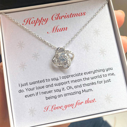 The Best Christmas Gift For Mum. Happy Christmas Mum Love Knot Necklace with heartfelt message. 14k white gold or 18k yellow gold finish.