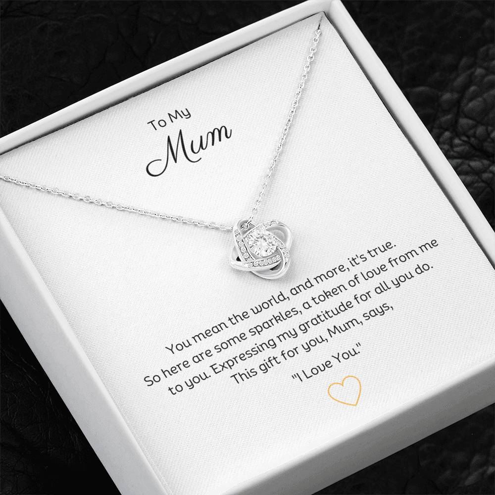 To My Mum, Beautiful Love Knot 14k or 18k finish Necklace. Features a beautiful pendant embellished with premium cubic zirconia crystals.