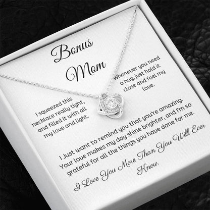 Bonus Mom, Beautiful Love Knot 14k or 18k finish Necklace. Features a beautiful pendant embellished with premium cubic zirconia crystals and heartfelt message card.