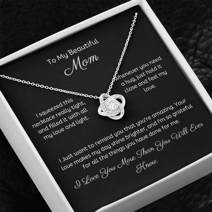 To My Mom, Beautiful Love Knot 14k or 18k finish Necklace. Features a beautiful pendant embellished with premium cubic zirconia crystals and heartfelt message card.