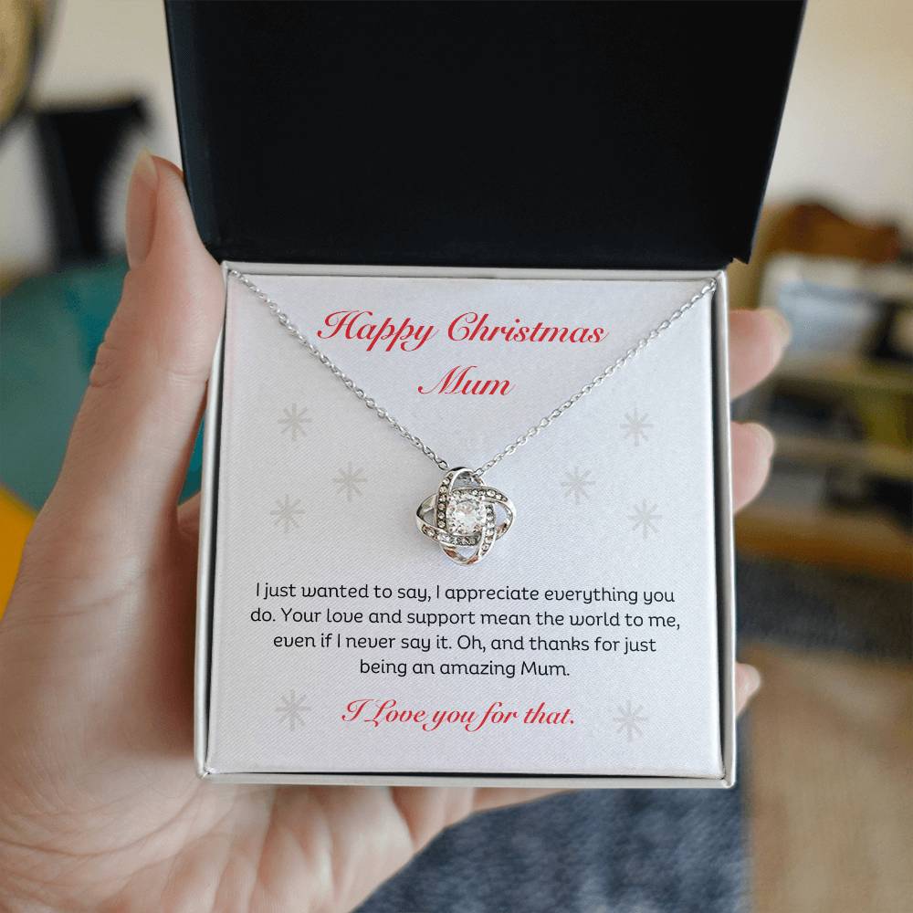 The Best Christmas Gift For Mum. Happy Christmas Mum Love Knot Necklace with heartfelt message. 14k white gold or 18k yellow gold finish.