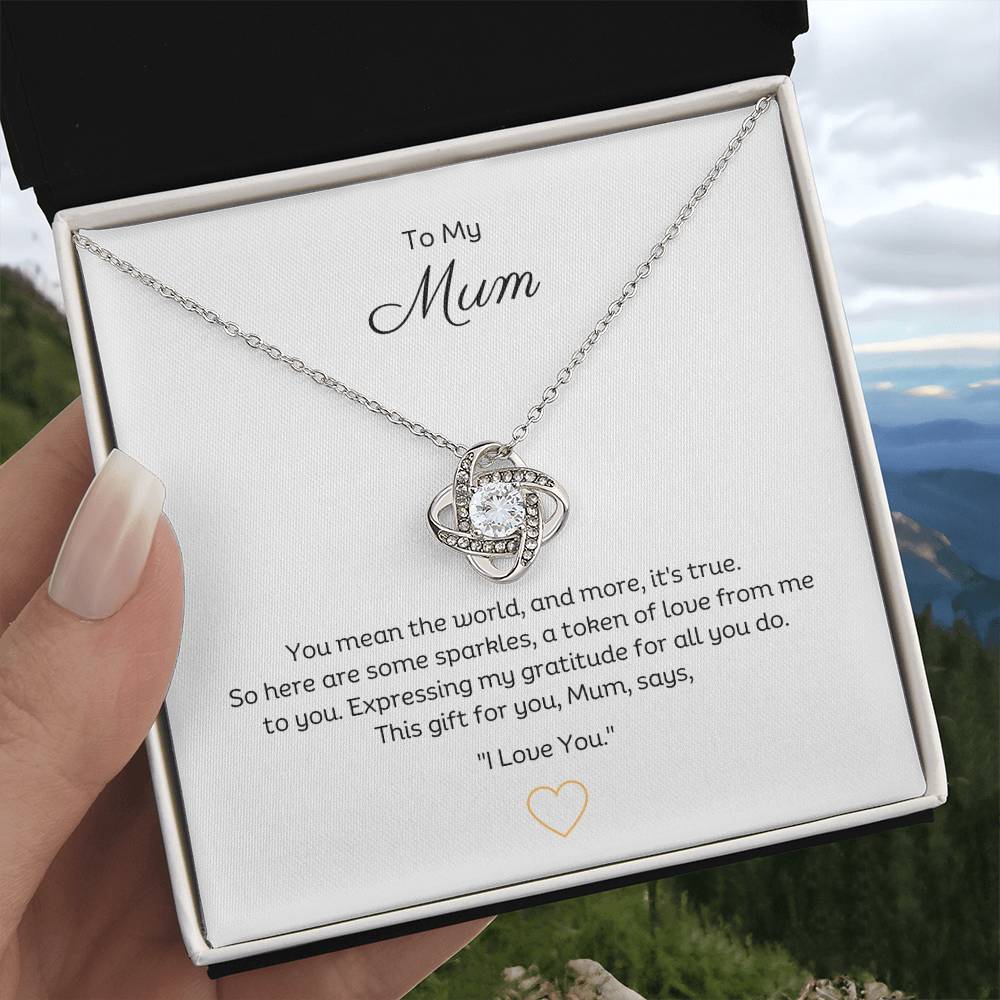 To My Mum, Beautiful Love Knot 14k or 18k finish Necklace. Features a beautiful pendant embellished with premium cubic zirconia crystals.