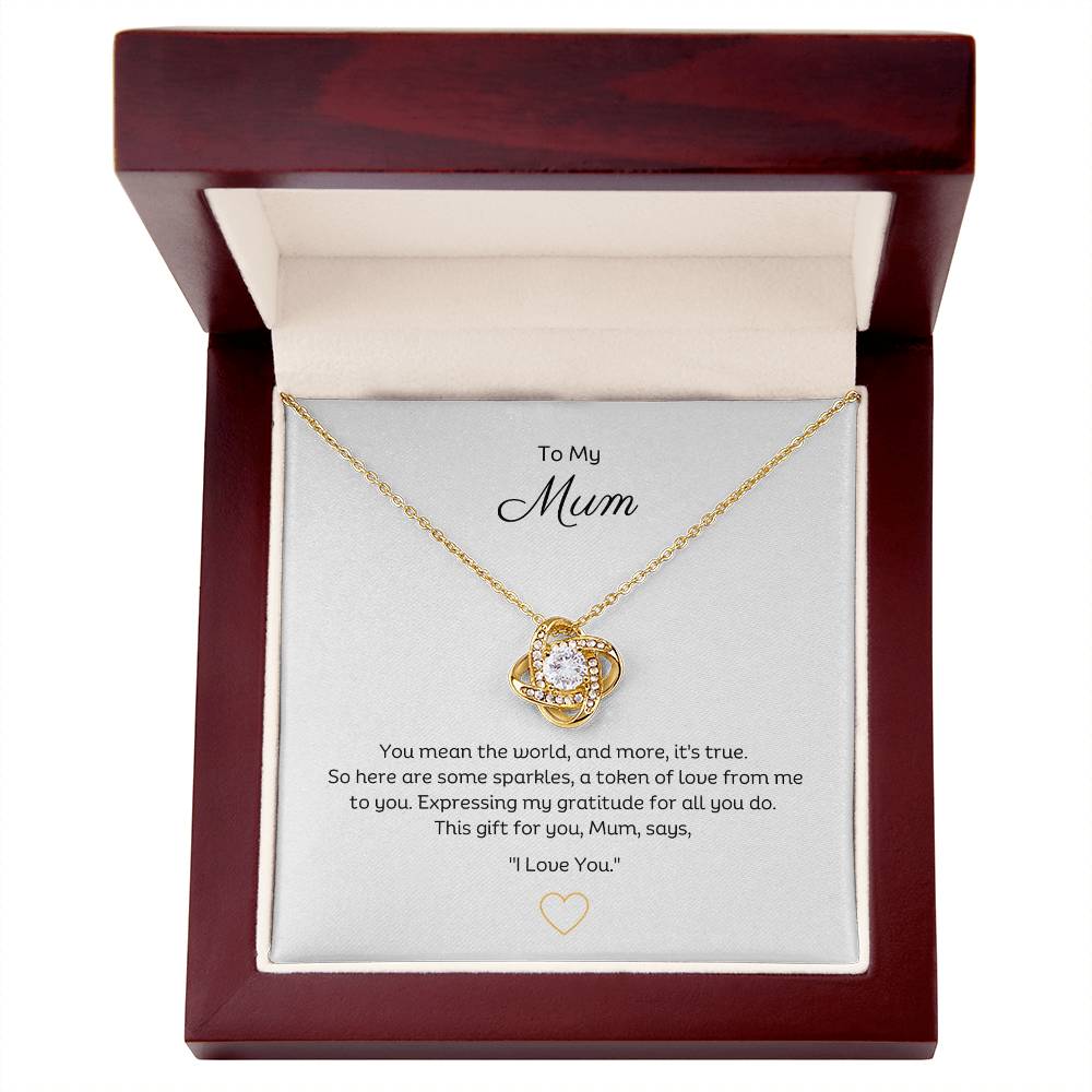 To My Mum, Beautiful Love Knot 14k or 18k finish Necklace. Features a beautiful pendant embellished with premium cubic zirconia crystals.