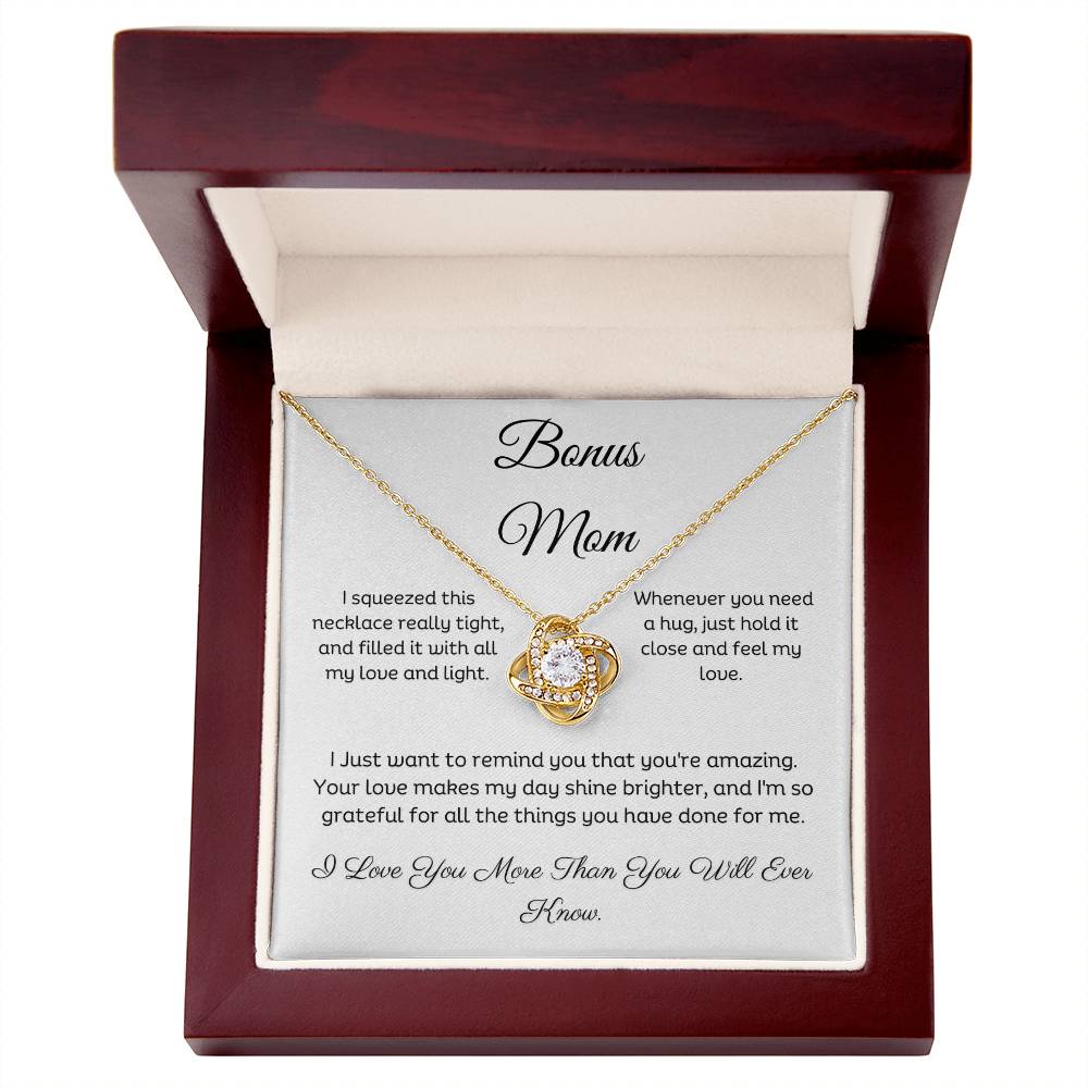 Bonus Mom, Beautiful Love Knot 14k or 18k finish Necklace. Features a beautiful pendant embellished with premium cubic zirconia crystals and heartfelt message card.