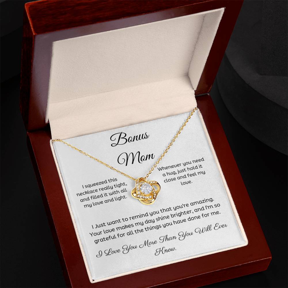 Bonus Mom, Beautiful Love Knot 14k or 18k finish Necklace. Features a beautiful pendant embellished with premium cubic zirconia crystals and heartfelt message card.