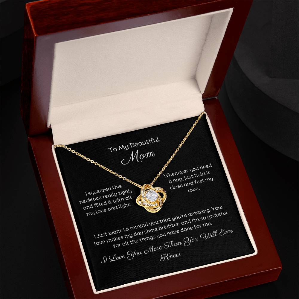 To My Mom, Beautiful Love Knot 14k or 18k finish Necklace. Features a beautiful pendant embellished with premium cubic zirconia crystals and heartfelt message card.