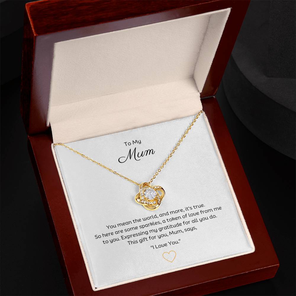 To My Mum, Beautiful Love Knot 14k or 18k finish Necklace. Features a beautiful pendant embellished with premium cubic zirconia crystals. 