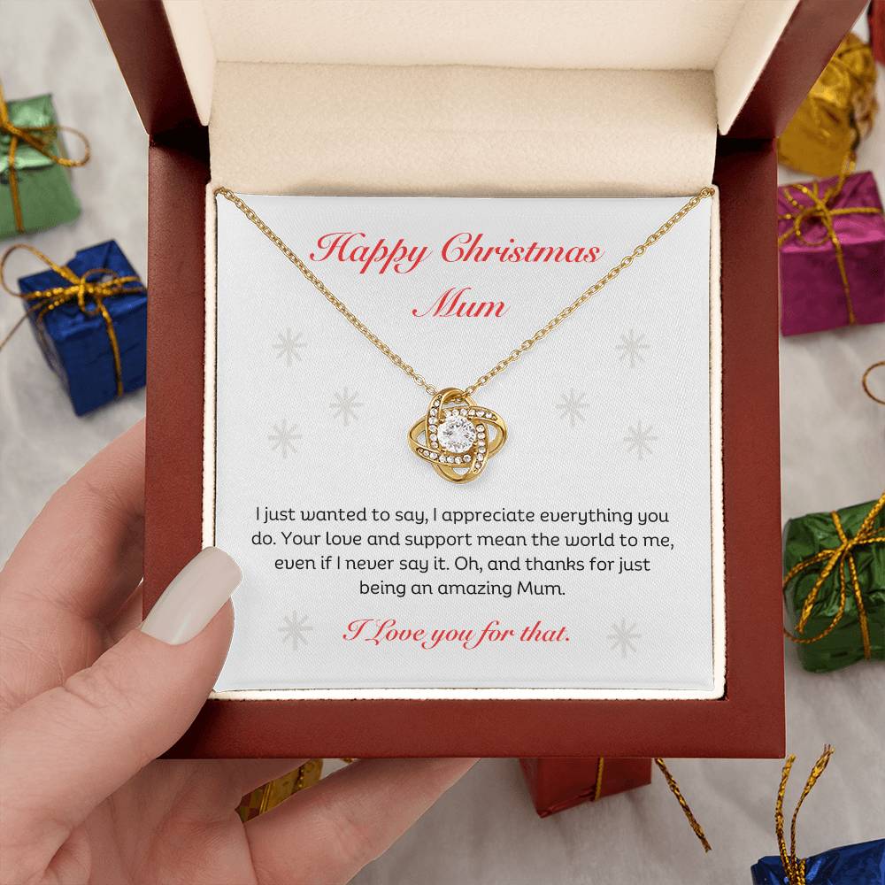 The Best Christmas Gift For Mum. Happy Christmas Mum Love Knot Necklace with heartfelt message. 14k white gold or 18k yellow gold finish.