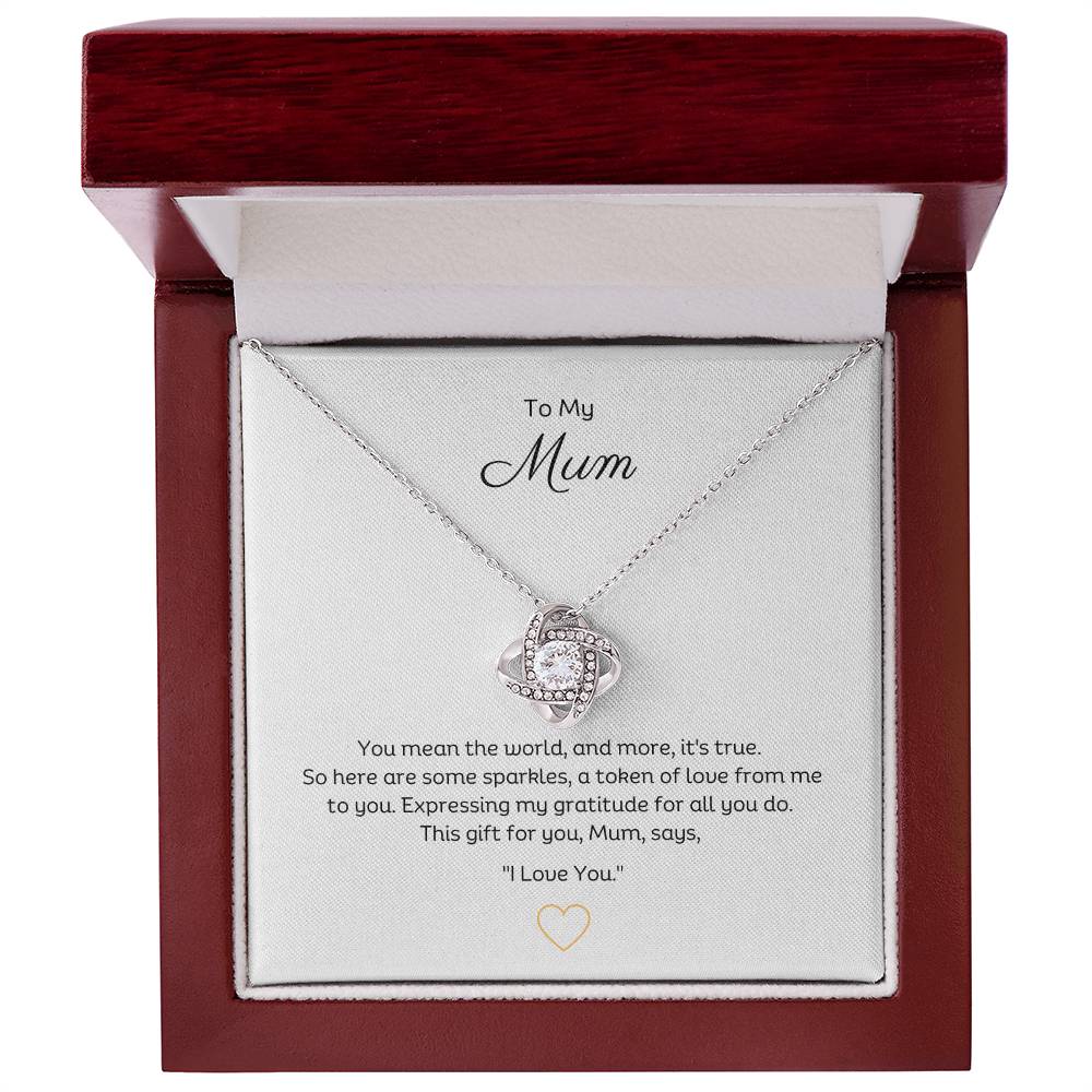 To My Mum, Beautiful Love Knot 14k or 18k finish Necklace. Features a beautiful pendant embellished with premium cubic zirconia crystals. 