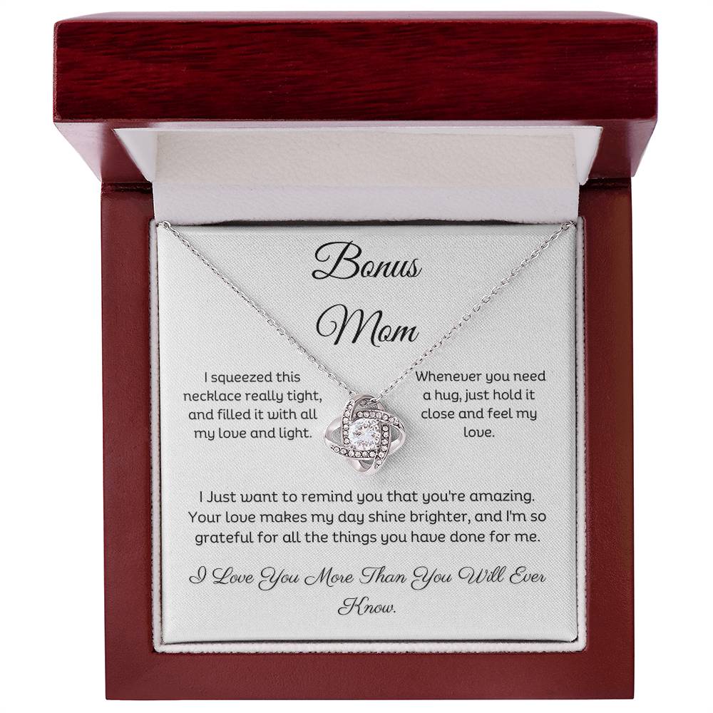 Bonus Mom, Beautiful Love Knot 14k or 18k finish Necklace. Features a beautiful pendant embellished with premium cubic zirconia crystals and heartfelt message card.