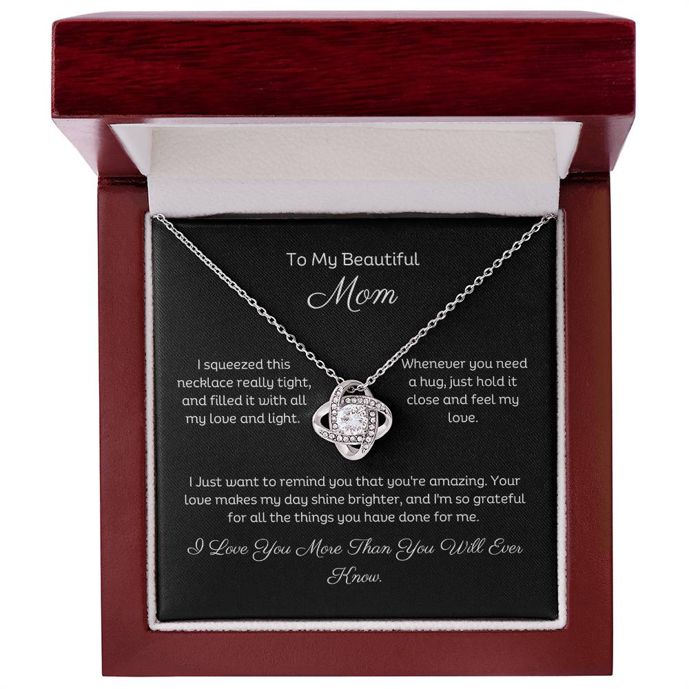 To My Mom, Beautiful Love Knot 14k or 18k finish Necklace. Features a beautiful pendant embellished with premium cubic zirconia crystals and heartfelt message card.