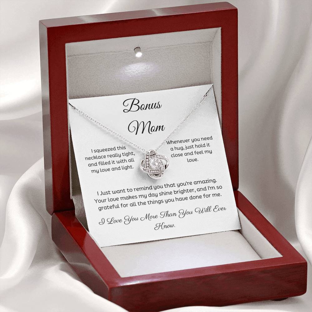 Bonus Mom, Beautiful Love Knot 14k or 18k finish Necklace. Features a beautiful pendant embellished with premium cubic zirconia crystals and heartfelt message card.