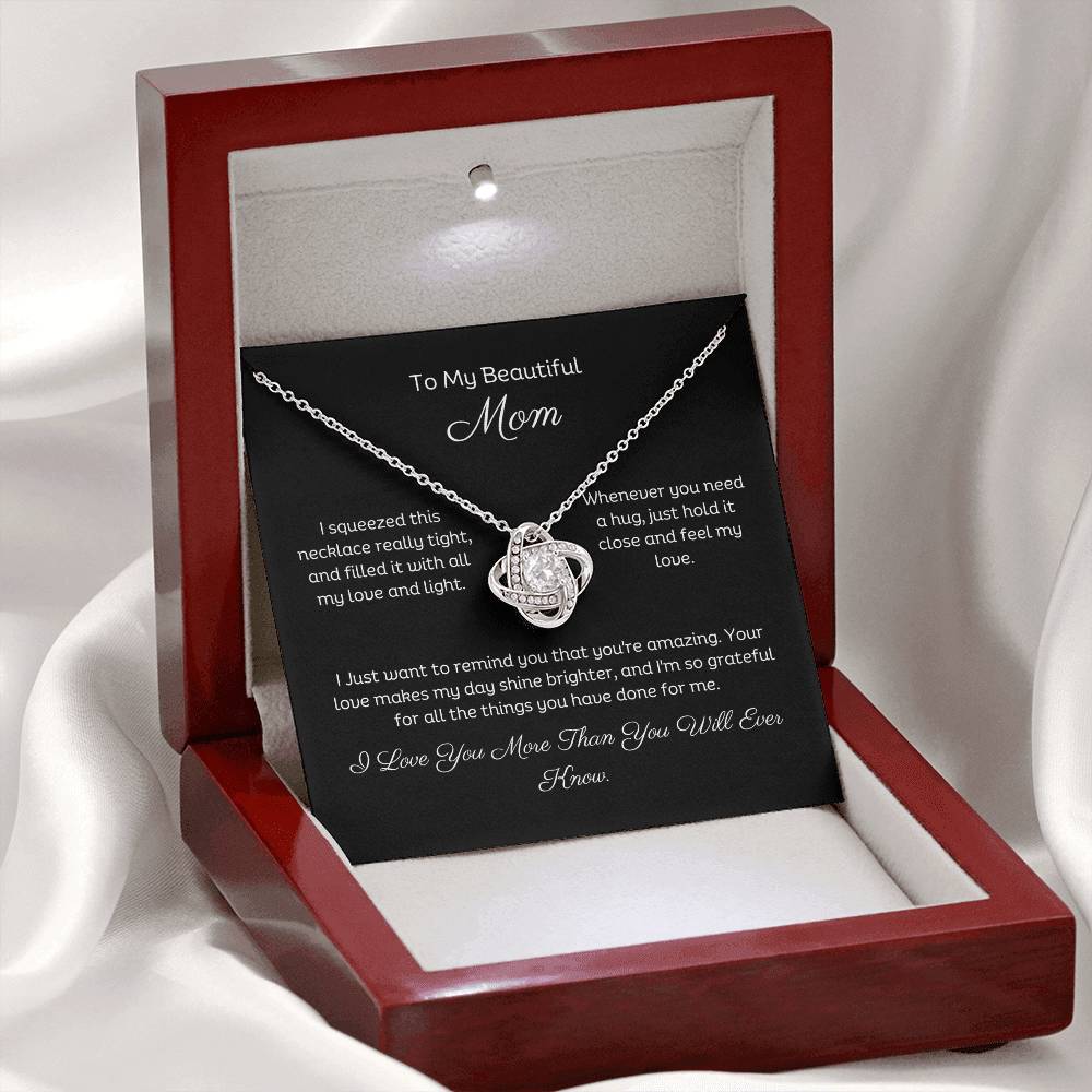 To My Mom, Beautiful Love Knot 14k or 18k finish Necklace. Features a beautiful pendant embellished with premium cubic zirconia crystals and heartfelt message card.