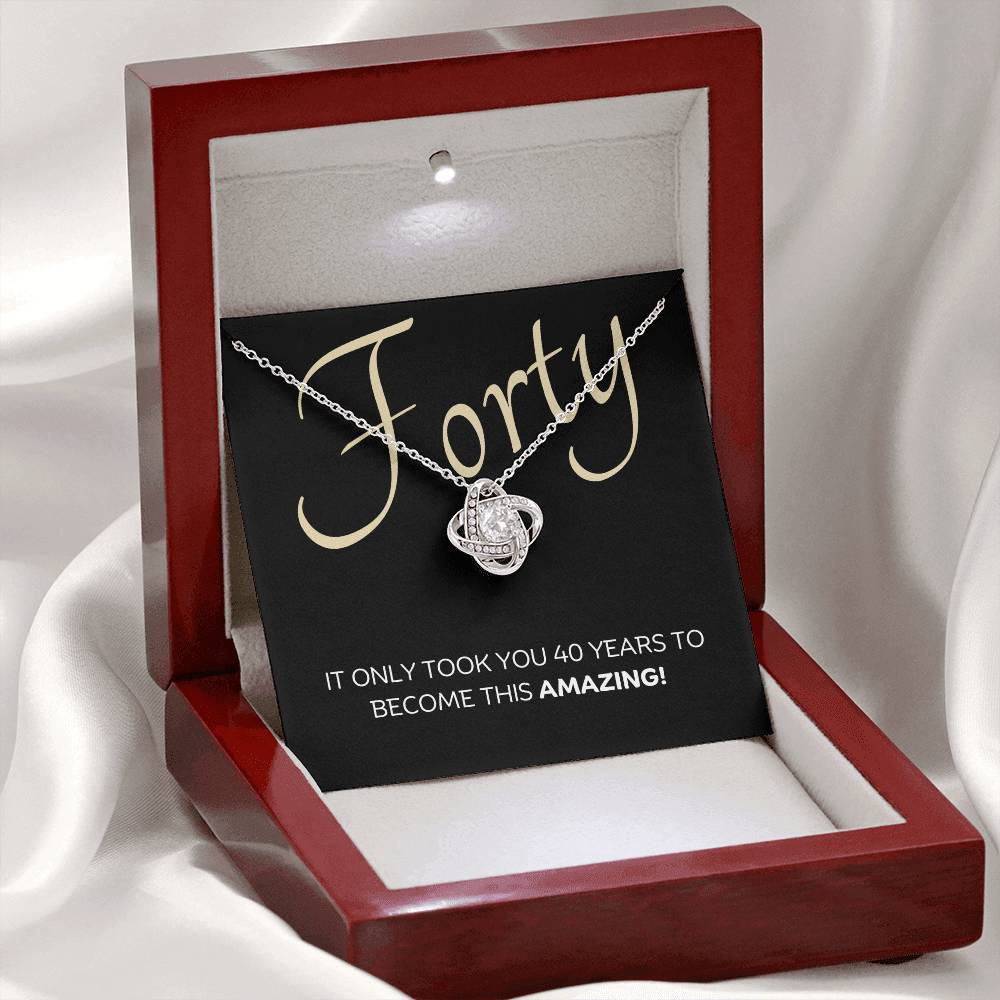 40th Birthday, Beautiful Love Knot 14k or 18k finish Necklace. Features a beautiful pendant embellished with premium cubic zirconia crystals and heartfelt message card.