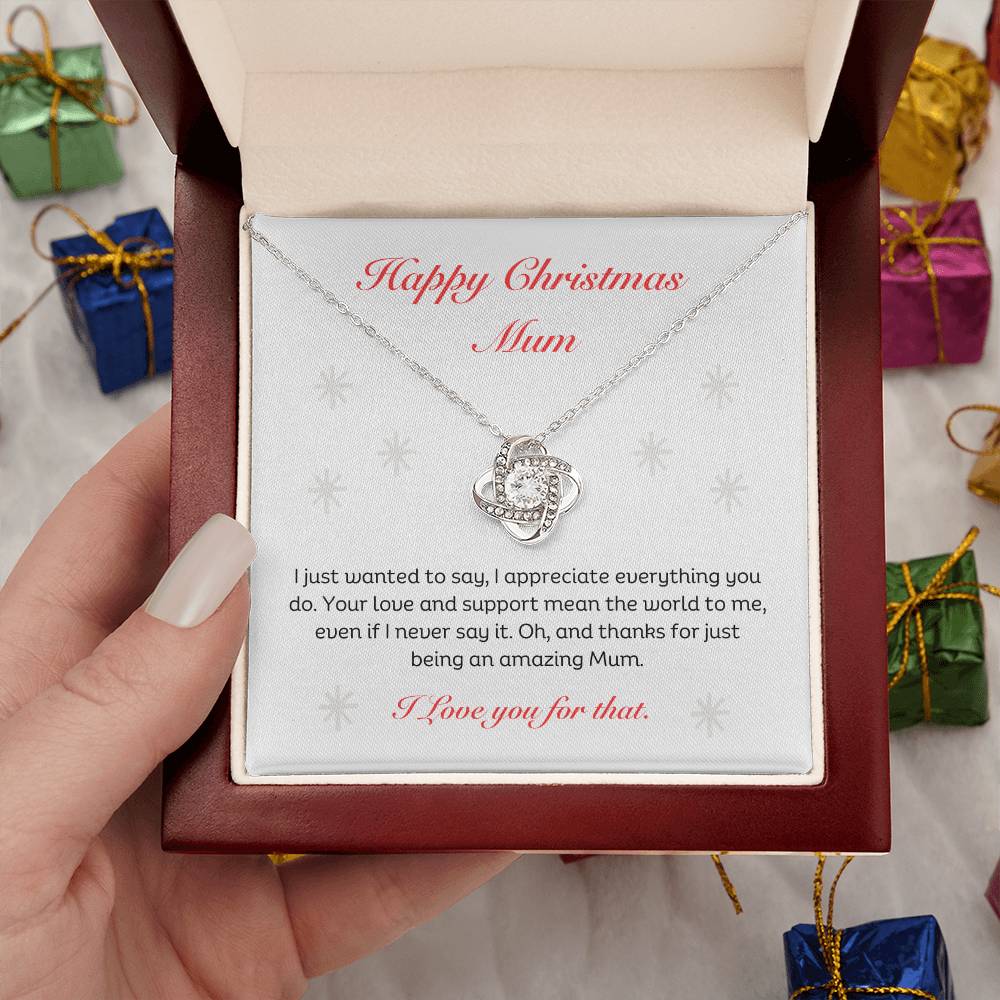 The Best Christmas Gift For Mum. Happy Christmas Mum Love Knot Necklace with heartfelt message. 14k white gold or 18k yellow gold finish.