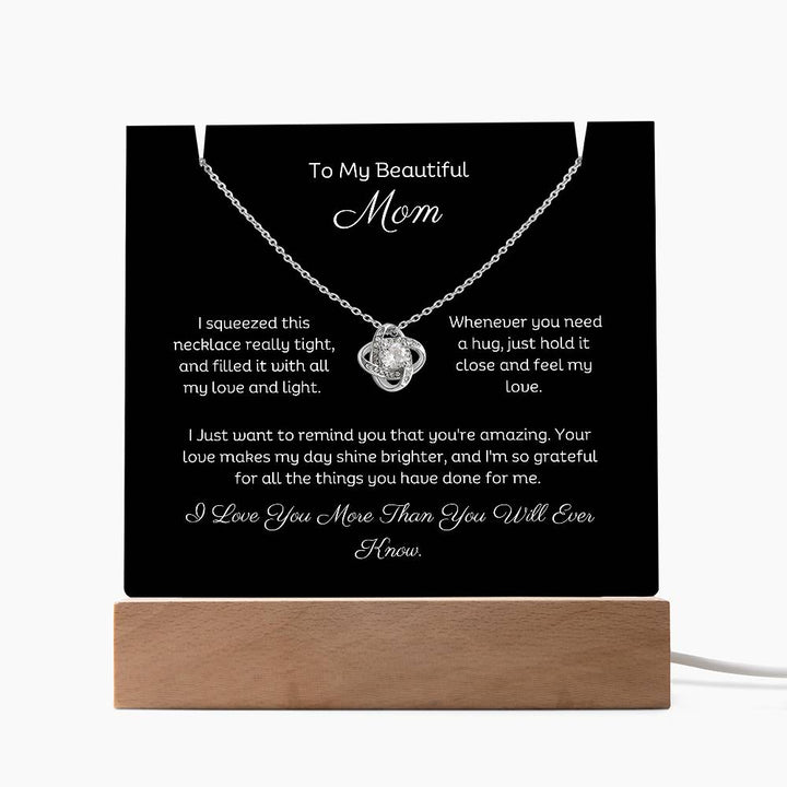 A stunning Square Acrylic and the beautiful Love Knot Necklace for Mom. The beautiful wife heartfelt message is showcased on crystal-clear acrylic, making this set a striking focal point in any space. Paired with the charming Love Knot Necklace.