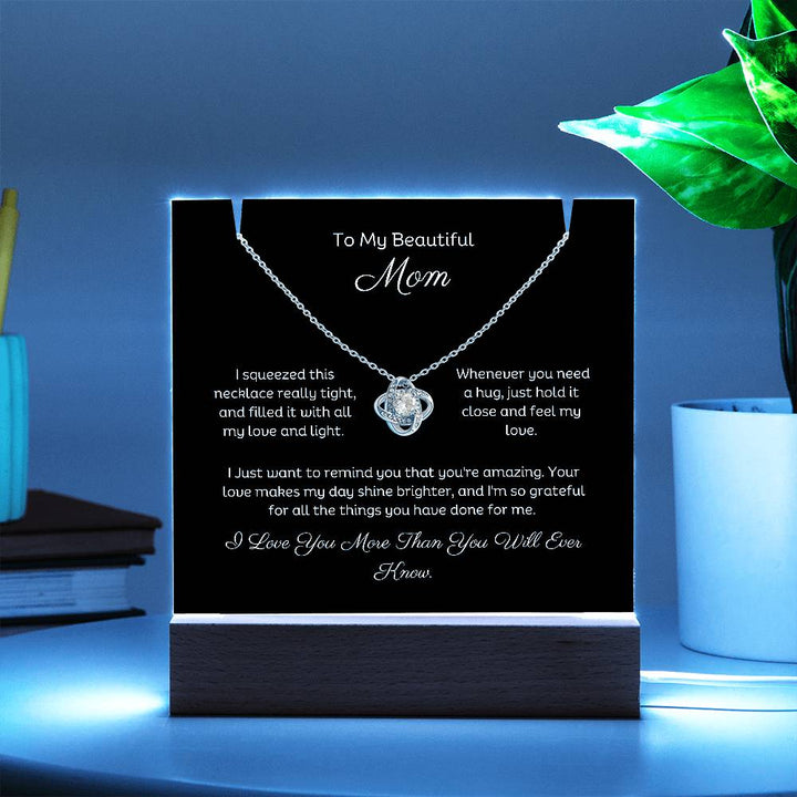 A stunning Square Acrylic and the beautiful Love Knot Necklace for Mom. The beautiful wife heartfelt message is showcased on crystal-clear acrylic, making this set a striking focal point in any space. Paired with the charming Love Knot Necklace.