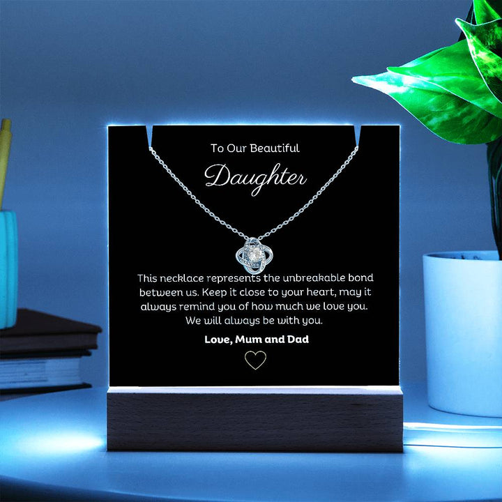 A stunning Square Acrylic and the beautiful Love Knot Necklace for Daughter. The heartfelt message is showcased on crystal-clear acrylic, making this set a striking focal point in any space. Paired with the charming Love Knot Necklace.