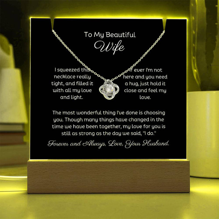 A stunning Square Acrylic and the beautiful Love Knot Necklace. The beautiful wife heartfelt message is showcased on crystal-clear acrylic, making this set a striking focal point in any space. Paired with the charming Love Knot Necklace.