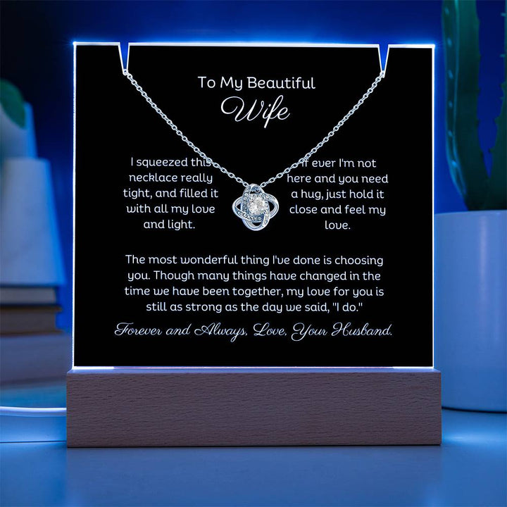 A stunning Square Acrylic and the beautiful Love Knot Necklace. The beautiful wife heartfelt message is showcased on crystal-clear acrylic, making this set a striking focal point in any space. Paired with the charming Love Knot Necklace.