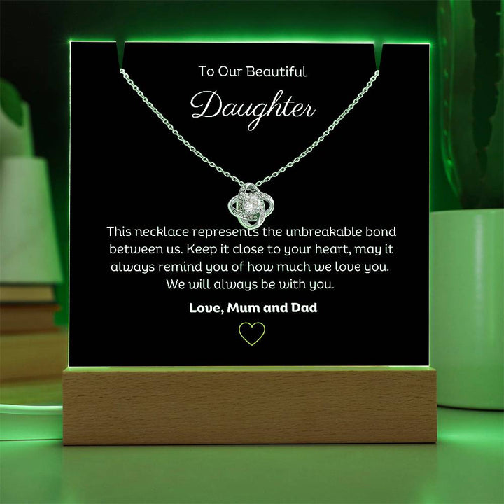 A stunning Square Acrylic and the beautiful Love Knot Necklace for Daughter. The heartfelt message is showcased on crystal-clear acrylic, making this set a striking focal point in any space. Paired with the charming Love Knot Necklace.