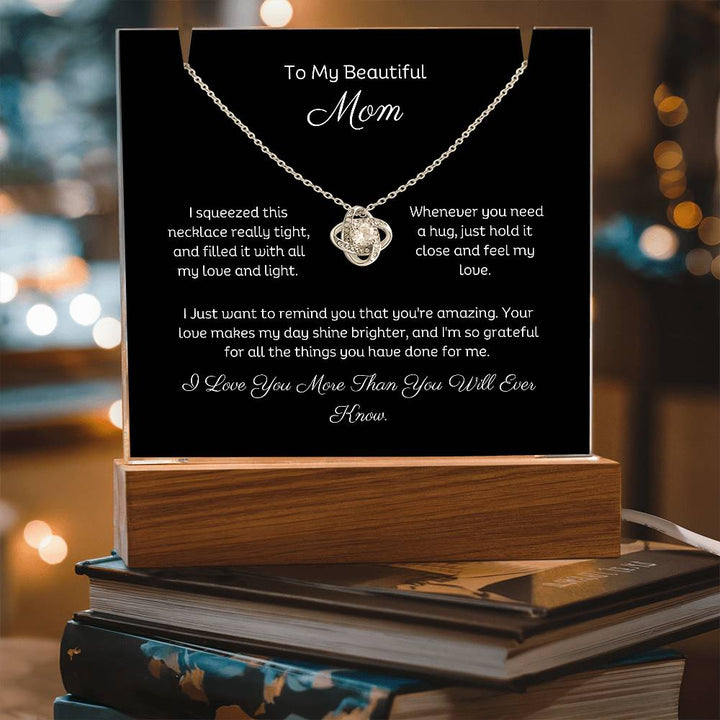 A stunning Square Acrylic and the beautiful Love Knot Necklace for Mom. The beautiful wife heartfelt message is showcased on crystal-clear acrylic, making this set a striking focal point in any space. Paired with the charming Love Knot Necklace.