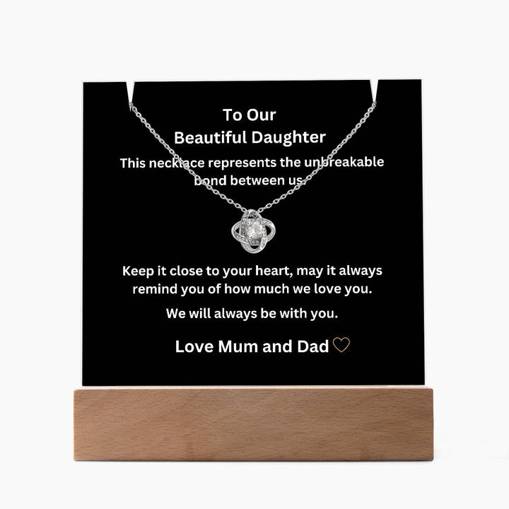 A stunning Square Acrylic and the beautiful Love Knot Necklace. The heartfelt message is showcased on crystal-clear acrylic, making this set a striking focal point in any space. Paired with the charming Love Knot Necklace.