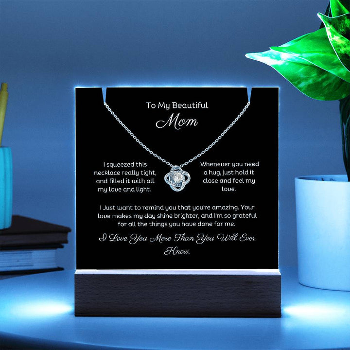 A stunning Square Acrylic and the beautiful Love Knot Necklace for Mom. The beautiful wife heartfelt message is showcased on crystal-clear acrylic, making this set a striking focal point in any space. Paired with the charming Love Knot Necklace.