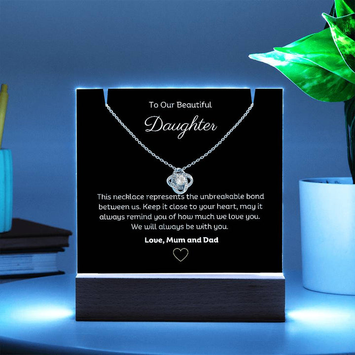 A stunning Square Acrylic and the beautiful Love Knot Necklace for Daughter. The heartfelt message is showcased on crystal-clear acrylic, making this set a striking focal point in any space. Paired with the charming Love Knot Necklace.