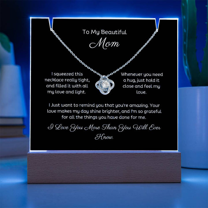 A stunning Square Acrylic and the beautiful Love Knot Necklace for Mom. The beautiful wife heartfelt message is showcased on crystal-clear acrylic, making this set a striking focal point in any space. Paired with the charming Love Knot Necklace.