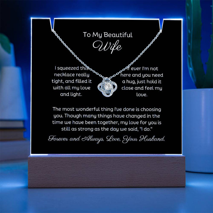 A stunning Square Acrylic and the beautiful Love Knot Necklace. The beautiful wife heartfelt message is showcased on crystal-clear acrylic, making this set a striking focal point in any space. Paired with the charming Love Knot Necklace.