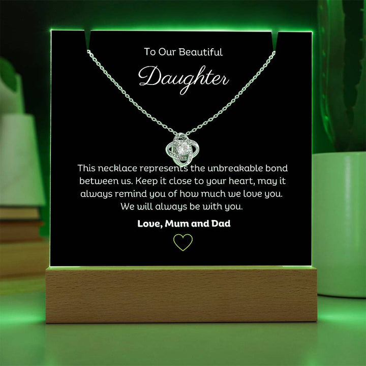 A stunning Square Acrylic and the beautiful Love Knot Necklace for Daughter. The heartfelt message is showcased on crystal-clear acrylic, making this set a striking focal point in any space. Paired with the charming Love Knot Necklace.