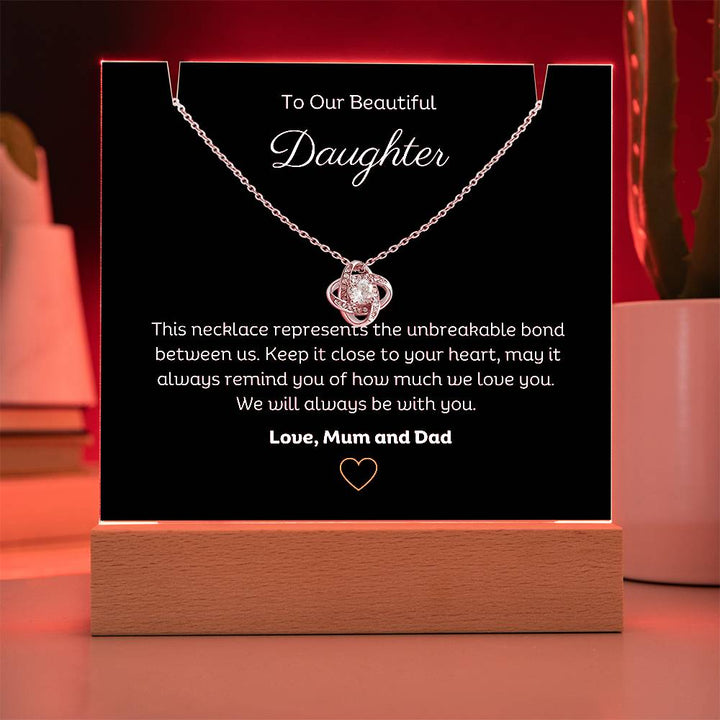 A stunning Square Acrylic and the beautiful Love Knot Necklace for Daughter. The heartfelt message is showcased on crystal-clear acrylic, making this set a striking focal point in any space. Paired with the charming Love Knot Necklace.