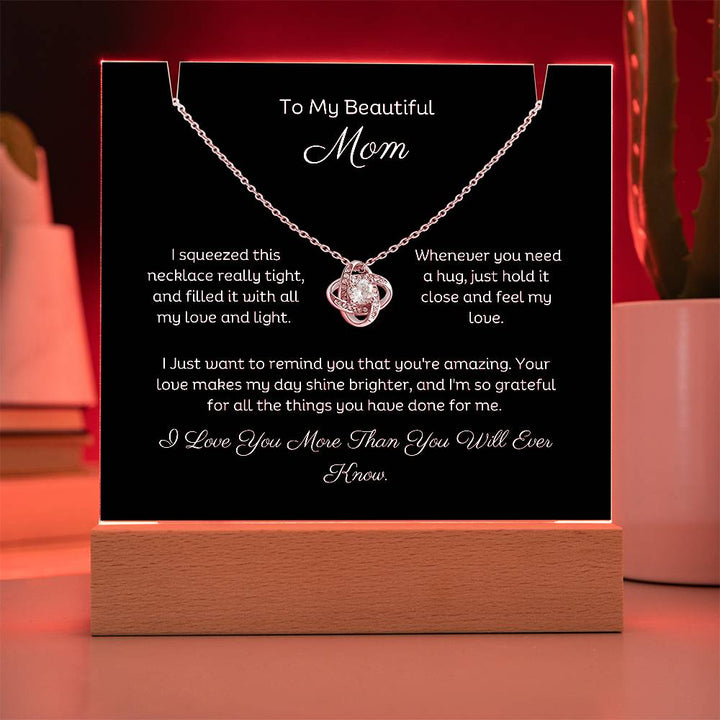 A stunning Square Acrylic and the beautiful Love Knot Necklace for Mom. The beautiful wife heartfelt message is showcased on crystal-clear acrylic, making this set a striking focal point in any space. Paired with the charming Love Knot Necklace.