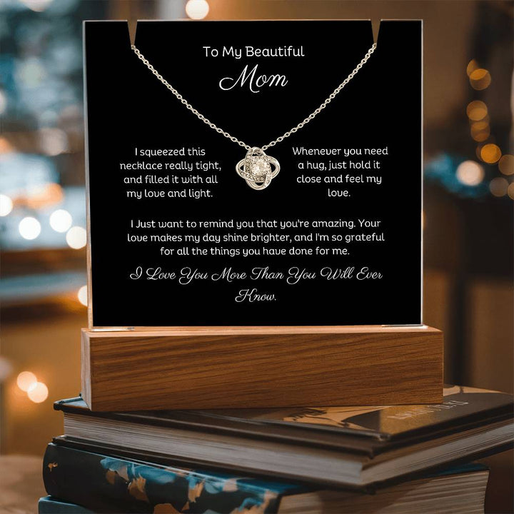 A stunning Square Acrylic and the beautiful Love Knot Necklace for Mom. The beautiful wife heartfelt message is showcased on crystal-clear acrylic, making this set a striking focal point in any space. Paired with the charming Love Knot Necklace.