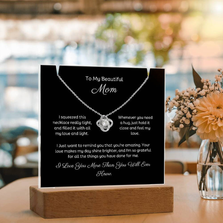 A stunning Square Acrylic and the beautiful Love Knot Necklace for Mom. The beautiful wife heartfelt message is showcased on crystal-clear acrylic, making this set a striking focal point in any space. Paired with the charming Love Knot Necklace.