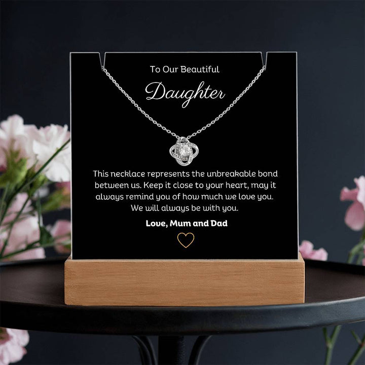 A stunning Square Acrylic and the beautiful Love Knot Necklace for Daughter. The heartfelt message is showcased on crystal-clear acrylic, making this set a striking focal point in any space. Paired with the charming Love Knot Necklace.