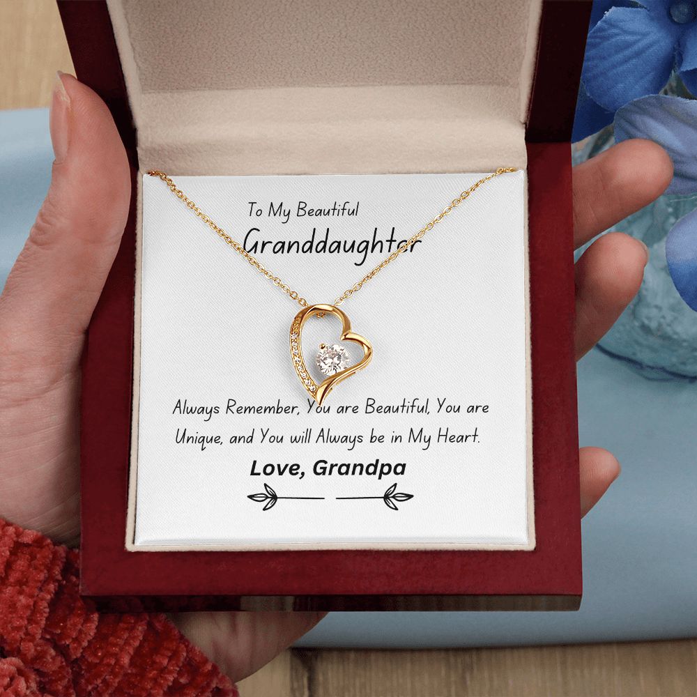 Beautiful heart necklace with either 14k white gold finish or 18k yellow gold finish and 6.5mm round cut cubic zirconia stone Pendant