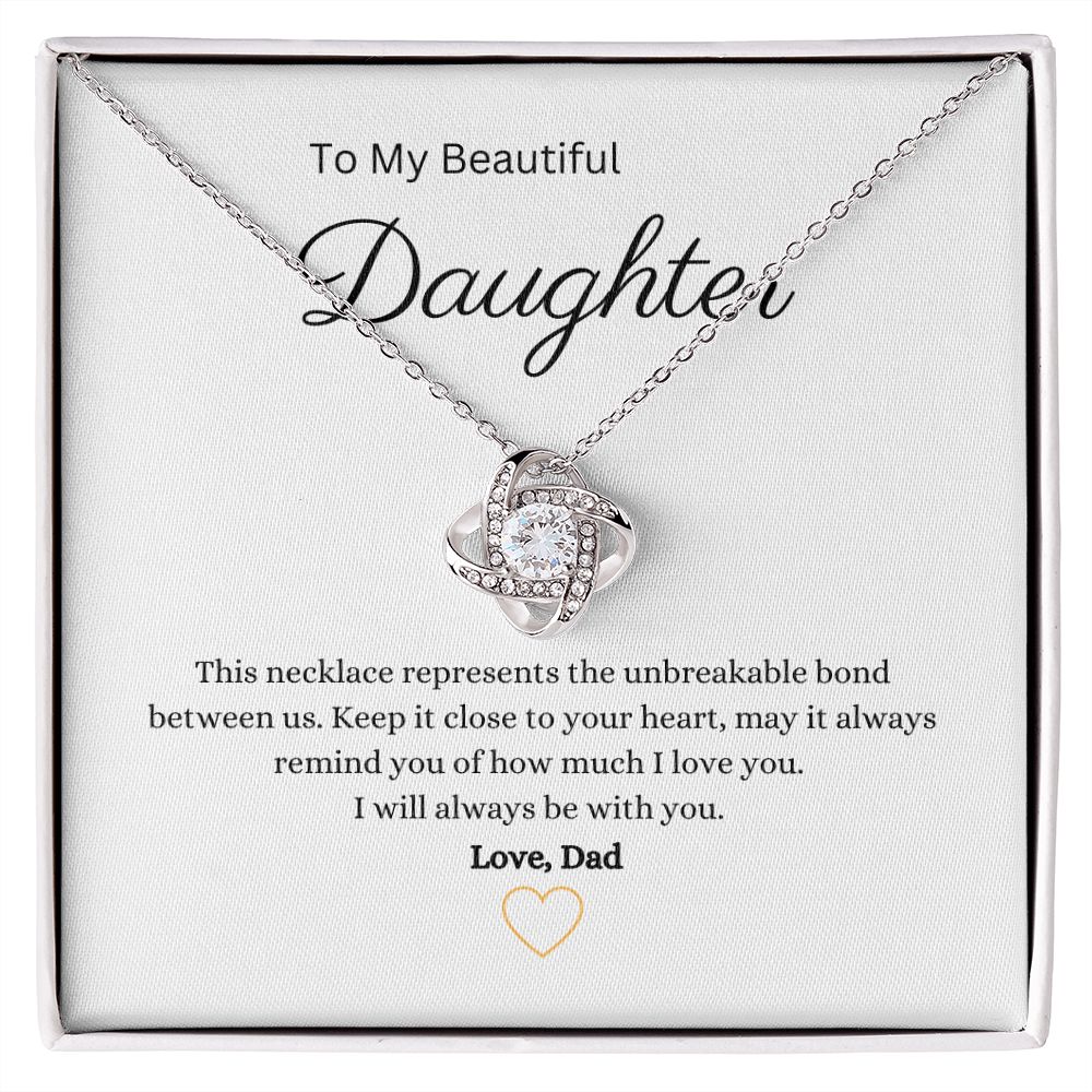 beautiful Love Knot Necklace that symbolizes your never-ending love. This piece features a beautiful pendant embellished with premium cubic zirconia crystals. 14k white gold over stainless steel or 18k yellow gold over stainless steel.