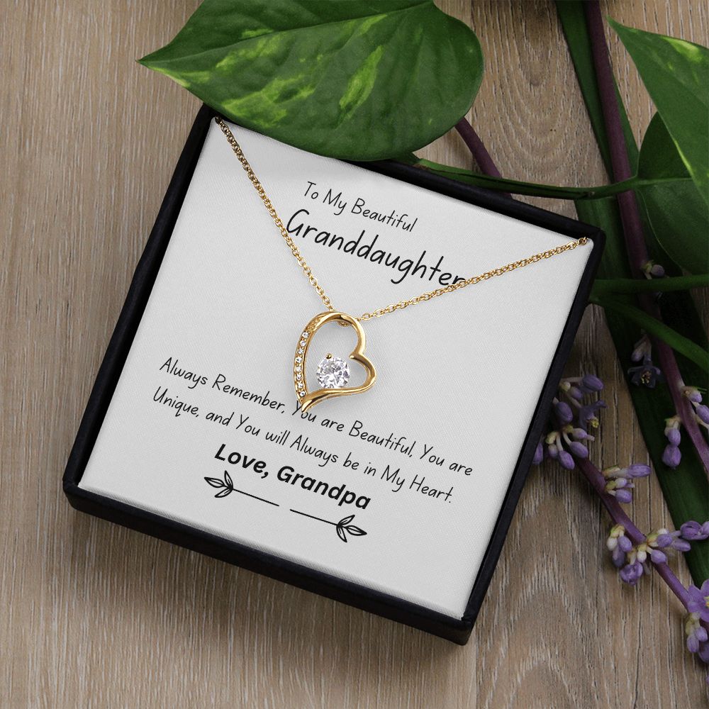 Beautiful heart necklace with either 14k white gold finish or 18k yellow gold finish and 6.5mm round cut cubic zirconia stone Pendant