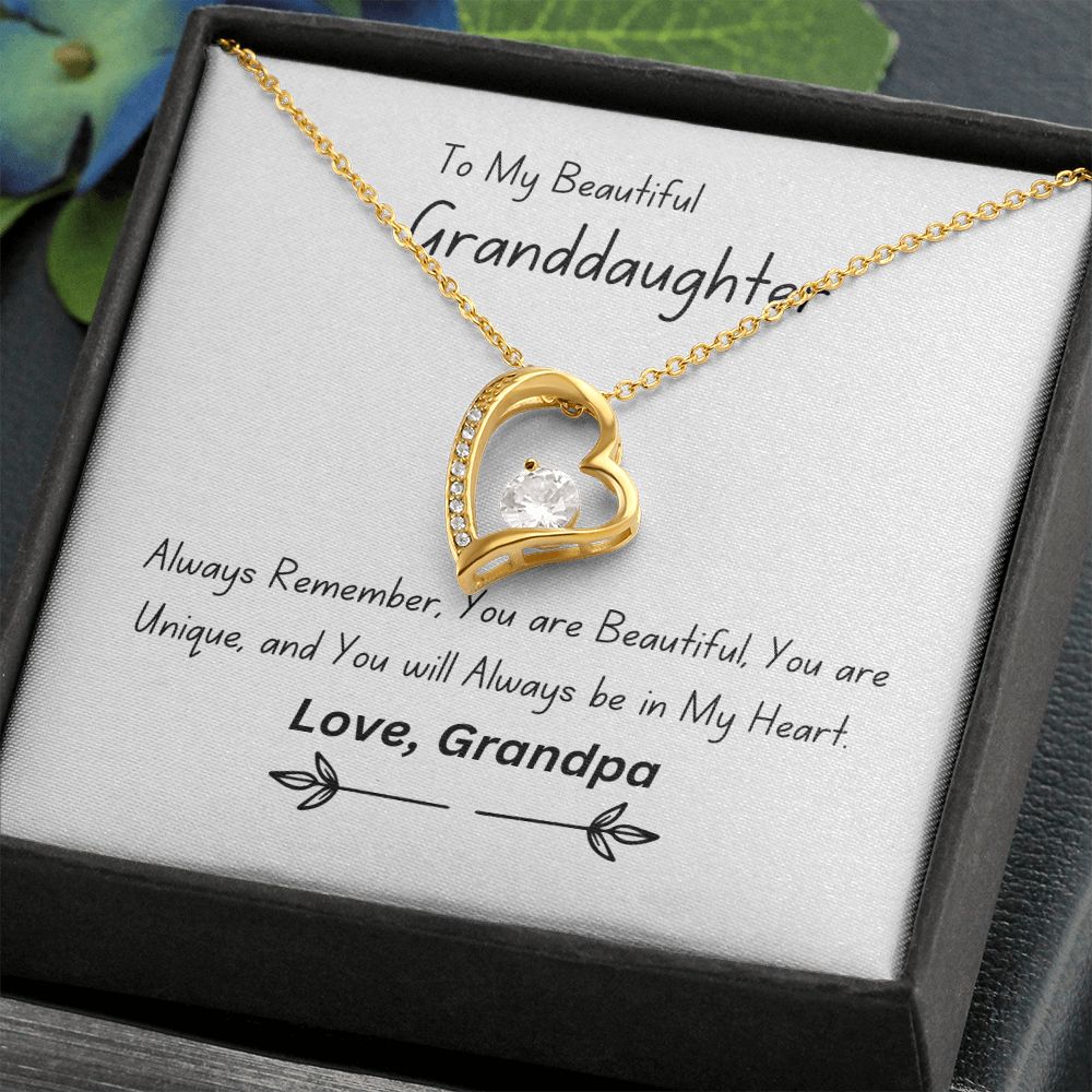 Beautiful heart necklace with either 14k white gold finish or 18k yellow gold finish and 6.5mm round cut cubic zirconia stone Pendant